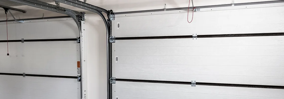 Fix Folding Garage Door Jerking in Doral, Florida