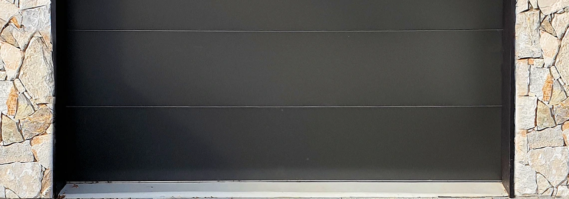 Overhead Black Garage Door Installation in Doral, Florida