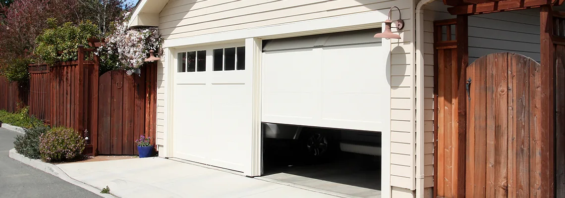 Fix Metal Garage Door Jerking in Doral